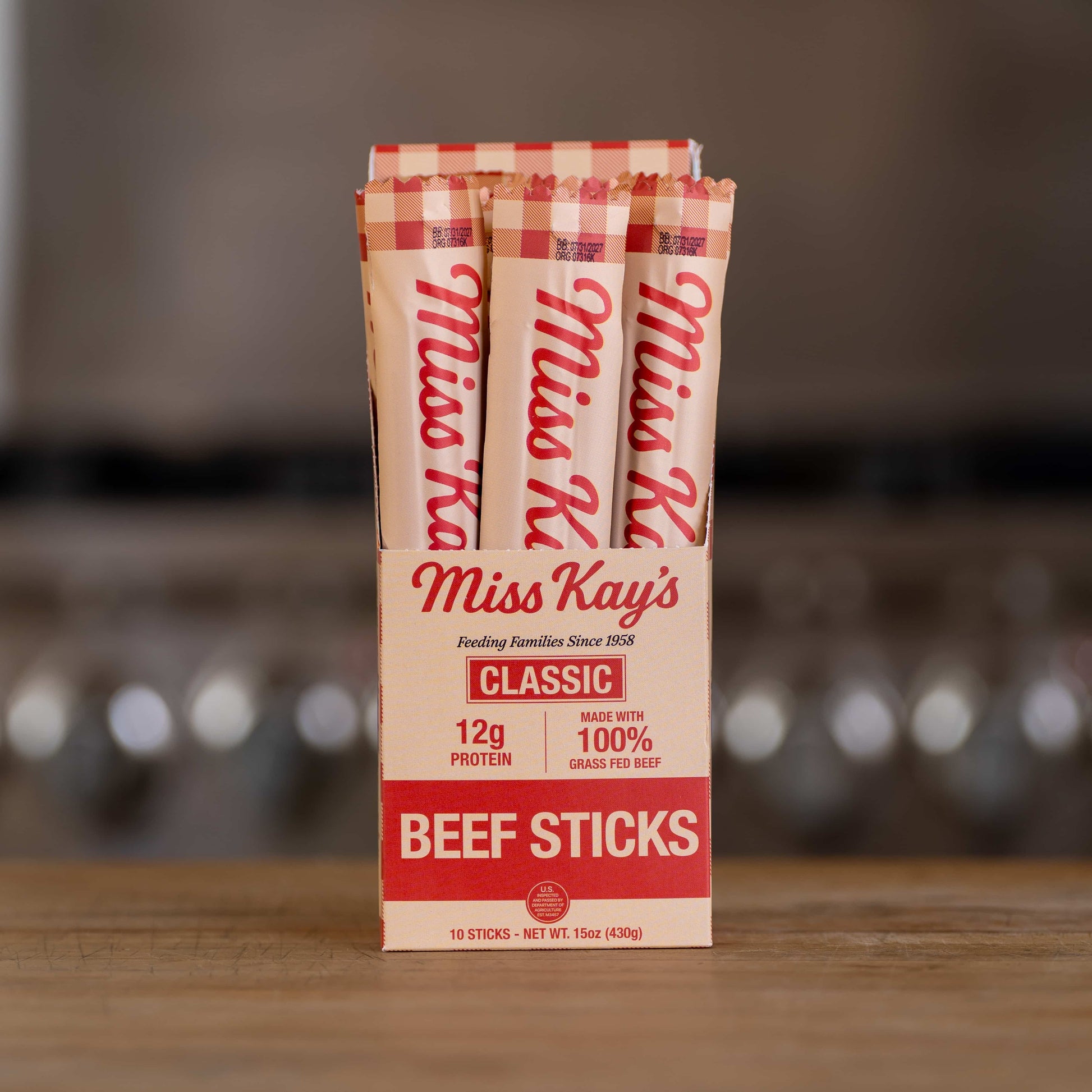 Miss Kay's Classic beef sticks box opened to show 10 individually wrapped 1.5 oz grass-fed beef sticks